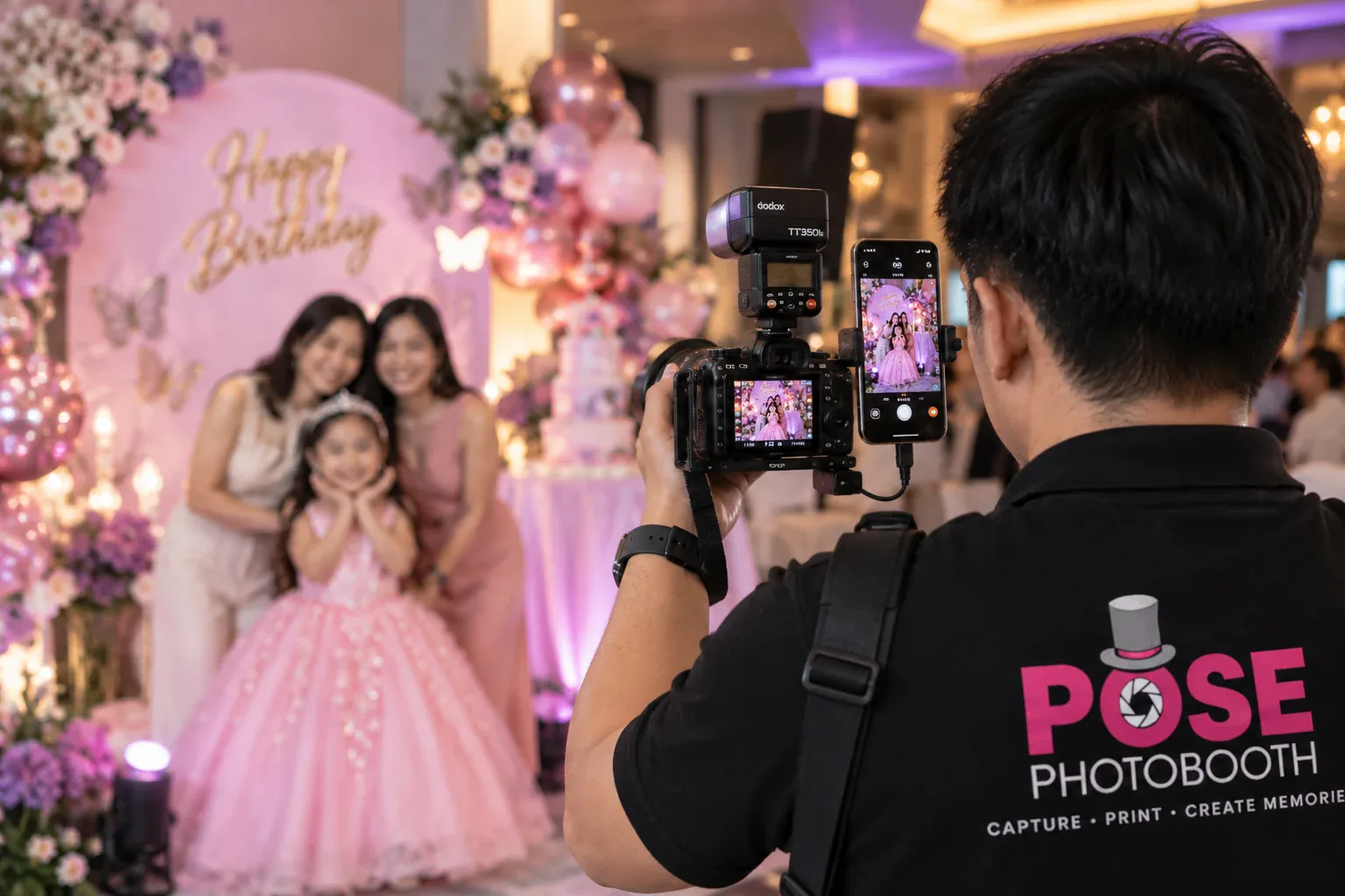 POSE Roaming Photobooth photographer capturing guests at a birthday event with Sony ZV-E10, Tamron 17-70mm f/2.8 and on-camera flash